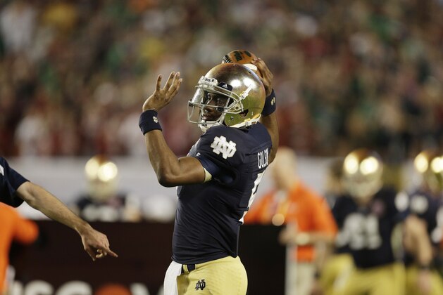 Notre Dame quarterback Everett Golson (5) works against Alabama during the first half of the BCS National Championship college football game Monday, Jan. 7, 2013, in Miami. (AP Photo/Chris O'Meara)