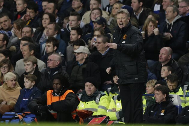 Manchester United's manager David Moyes shouts out as he watches his team during the English Premier League soccer match between Chelsea and Manchester United at Stamford Bridge stadium in London, Sunday, Jan. 19, 2014. (AP Photo/Matt Dunham)