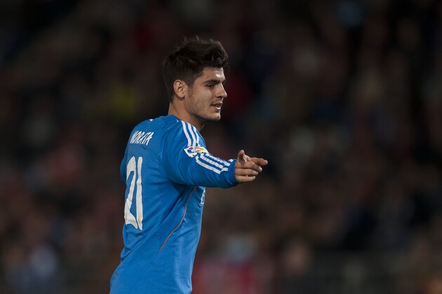 Real Madrid's Alvaro Morata celebrates after scoring against Almeria during a Spanish La Liga soccer match in Almeria, Spain, Saturday, Nov. 23, 2013. (AP Photo/Daniel Tejedor)