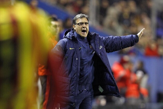 Barcelona's coach Gerardo Tata Martino from Argentina, gestures to the players during their La Liga soccer match against Levante at the Ciutat de Valencia stadium in Valencia, Spain, Sunday, Jan. 19, 2014. (AP Photo/Alberto Saiz) Barcelona's coach Gerardo Tata Martino from Argentina, gestures to the players during their La Liga soccer match against Levante at the Ciutat de Valencia stadium in Valencia, Spain, Sunday, Jan. 19, 2014. (AP Photo/Alberto Saiz)