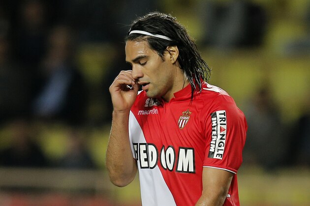 Monaco's Falcao of Colombia gestures during his French League One soccer match against Evian, in Monaco stadium, Friday, Nov. 8, 2013. (AP Photo/Lionel Cironneau)