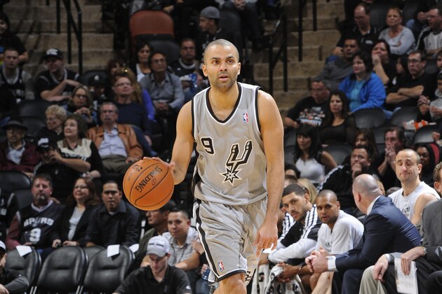 SAN ANTONIO, TX - January 17:  Tony Parker #9 of the San Antonio Spurs dribbles up the court against the Portland Trail Blazers during the game at the AT&T Center on January 17, 2014 in San Antonio, Texas. NOTE TO USER: User expressly acknowledges and agrees that, by downloading and or using this photograph, user is consenting to the terms and conditions of the Getty Images License Agreement. Mandatory Copyright Notice: Copyright 2014 NBAE (Photos by D. Clarke Evans/NBAE via Getty Images)