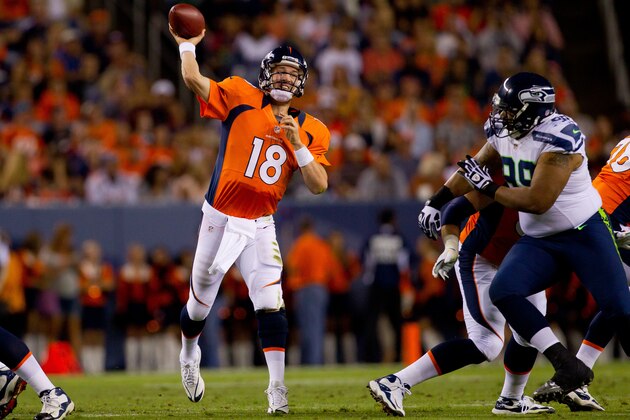 DENVER, CO - AUGUST 18:  Quarterback Peyton Manning #18 of the Denver Broncos throws for a completion during the second quarter against the Seattle Seahawks at Sports Authority Field Field at Mile High on August 18, 2012 in Denver, Colorado. (Photo by Justin Edmonds/Getty Images)