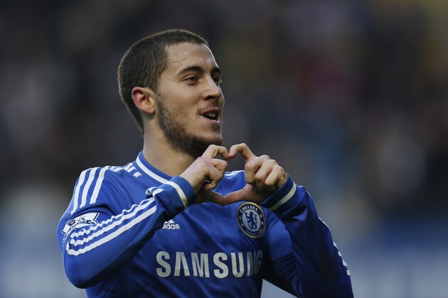 Chelsea's Eden Hazard celebrates his goal against Swansea City during their English Premier League soccer match at the Stamford Bridge ground in London, Thursday, Dec. 26, 2013. Chelsea won the match 1-0.(AP Photo/Lefteris Pitarakis)