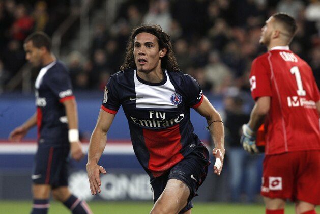 Paris Saint Germain's forward Edinson Cavani from Uruguay during his French League one soccer match against Sochaux, at the Parc des Princes stadium, in Paris, Saturday, Dec. 7, 2013. (AP Photo/Thibault Camus)