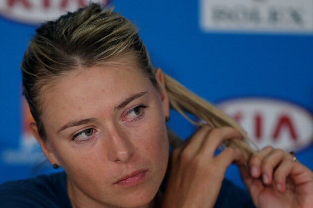 Maria Sharapova of Russia answers questions during a press conference following her fourth round loss to Dominika Cibulkova of Slovakia at the Australian Open tennis championship in Melbourne, Australia, Monday, Jan. 20, 2014. (AP Photo/Shuji Kajiyama Shuji)