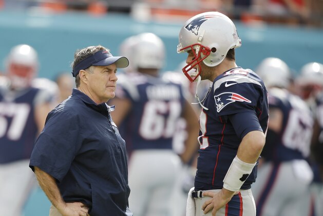 New England Patriots head coach Bill Belichick, left, and New England Patriots quarterback Tom Brady (12) talks on the sidelines before an NFL football game against the Miami Dolphins, Sunday, Dec. 15, 2013, in Miami Gardens, Fla. (AP Photo/Lynne Sladky)