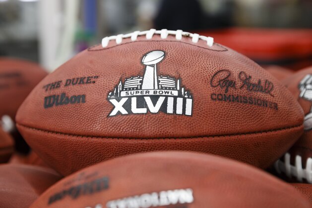 Official game balls for the NFL football Super Bowl XLVIII in the Wilson Sporting Goods Co. in Ada, Ohio, Monday, Jan. 20, 2014. The Seattle Seahawks will play the Denver Broncos in the Super Bowl on Feb. 2 in New Jersey. (AP Photo/Rick Osentoski)