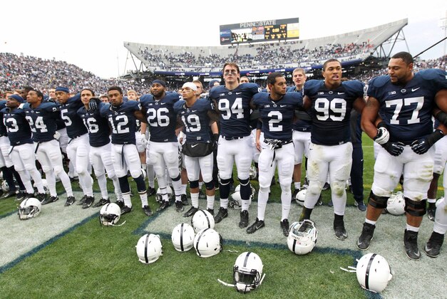 Nov 2, 2013; University Park, PA, USA; Penn State Nittany Lions players sing the alma mater following the completion of the game against the Illinois Fighting Illini at Beaver Stadium. Penn State defeated Illinois 24-17. Mandatory Credit: Matthew O'Haren-USA TODAY Sports