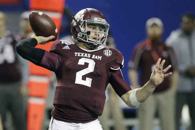 Texas A&M quarterback Johnny Manziel (2) looks for a receiver in the second half of the Chick-fil-A Bowl NCAA college football game against Duke Tuesday, Dec. 31, 2013, in Atlanta. (AP Photo/John Bazemore)