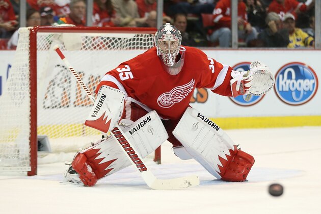 DETROIT, MI - JANUARY 18: Jimmy Howard #35 of the Detroit Red Wings gets ready to make the save during the second period of the game against the Los Angeles Kings at Joe Louis Arena on January 18, 2014 in Detroit, Michigan. The Wings defeated the Kings 3-2 in a shootout.  (Photo by Leon Halip/Getty Images)