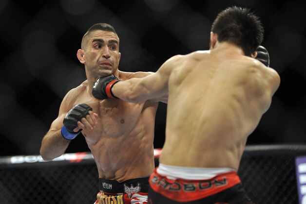 Jun 22, 2012; Atlantic City, NJ, USA; Ricardo Lamas (left) fights Hatsu Hioki in a featherweight bout during UFC on FX at Revel Resort and Casino.  Ricardo Lamas won the fight by unanimous decision in the third round.  Mandatory Credit: Joe Camporeale-USA TODAY Sports