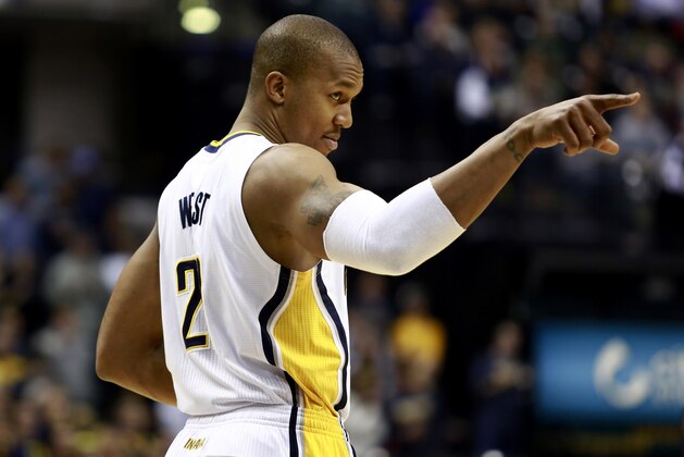 Indiana Pacers forward David West points toward the New Orleans Pelicans bench in the first half of an NBA basketball game against the New Orleans Pelicans in Indianapolis, Saturday, Jan. 4, 2014. (AP Photo/R Brent Smith)