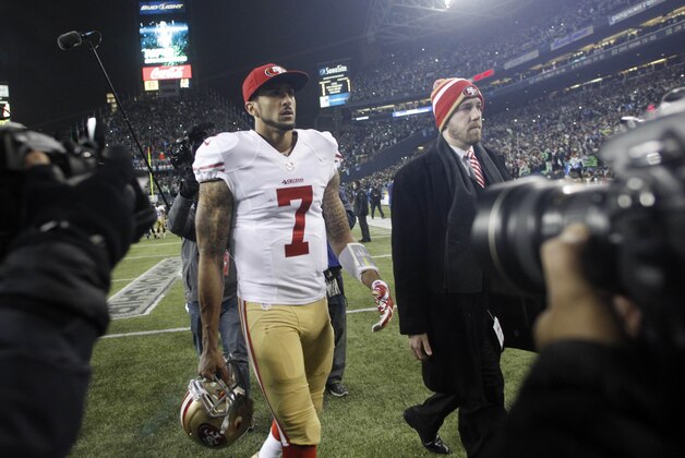 Jan 19, 2014; Seattle, WA, USA; San Francisco 49ers quarterback Colin Kaepernick (7) walks off the field after the 2013 NFC Championship football game against the Seattle Seahawks at CenturyLink Field. Mandatory Credit: Joe Nicholson-USA TODAY Sports Jan 19, 2014; Seattle, WA, USA; San Francisco 49ers quarterback Colin Kaepernick (7) walks off the field after the 2013 NFC Championship football game against the Seattle Seahawks at CenturyLink Field. Mandatory Credit: Joe Nicholson-USA TODAY Sports