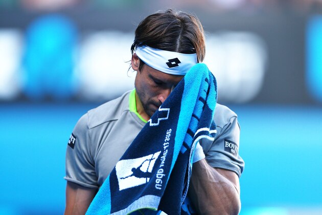 MELBOURNE, AUSTRALIA - JANUARY 21:  David Ferrer of Spain reacts in his quarterfinal match against Tomas Berdych of the Czech Republic during day nine of the 2014 Australian Open at Melbourne Park on January 21, 2014 in Melbourne, Australia.  (Photo by Renee McKay/Getty Images)