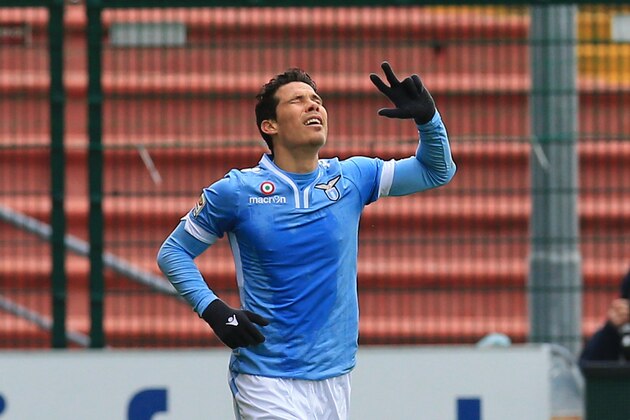 Lazio's Anderson Hernanes, celebrates after scoring during the Serie A soccer match between Udinese and Lazio at the Friuli Stadium in Udine, Italy, Sunday, Jan. 19, 2014. Ten-man Lazio fought back after twice trailing to win 3-2 at Udinese in Serie A on Sunday. (AP Photo/Paolo Giovannini)
