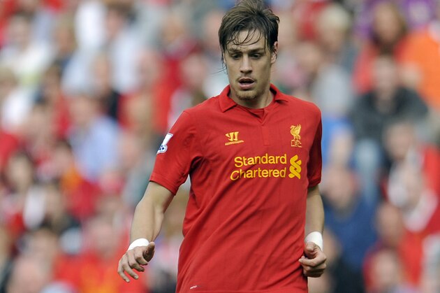 Liverpool's Sebastian Coates during their English Premier League soccer match at Anfield in Liverpool, England, Sunday Aug. 26, 2012. (AP Photo/Clint Hughes)