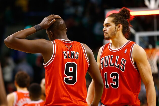 BOSTON, MA - FEBRUARY 13: Luol Deng #9 and Joakim Noah #13 of the Chicago Bulls walk off of the court following their 71-69 loss against the Boston Celtics during the game on February 13, 2013 at TD Garden in Boston, Massachusetts. NOTE TO USER: User expressly acknowledges and agrees that, by downloading and or using this photograph, User is consenting to the terms and conditions of the Getty Images License Agreement. (Photo by Jared Wickerham/Getty Images)