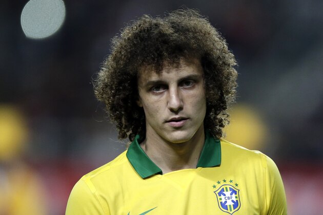Brazil's David Luiz lines up before their friendly soccer match against South Korea at Seoul World Cup Stadium in Seoul, South Korea, Saturday, Oct.12, 2013. (AP Photo/Lee Jin-man)