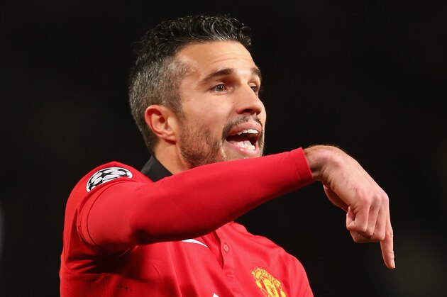 MANCHESTER, ENGLAND - DECEMBER 10:  Robin van Persie of Manchester United gestures during the UEFA Champions League Group A match between Manchester United and Shakhtar Donetsk at Old Trafford on December 10, 2013 in Manchester, England.  (Photo by Michael Steele/Getty Images)