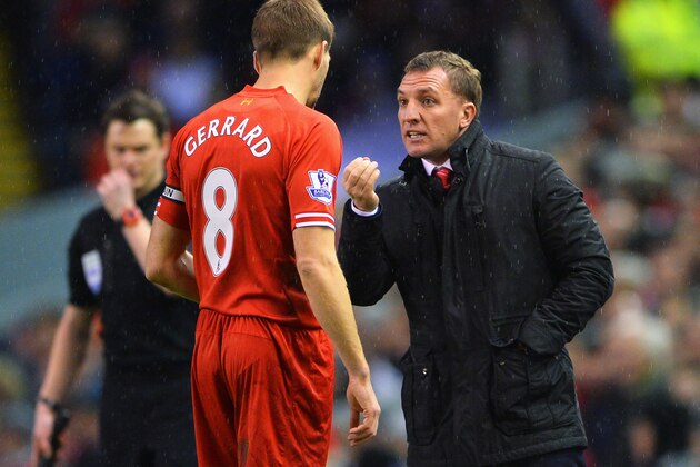 LIVERPOOL, ENGLAND - JANUARY 18: Brendan Rodgers, manager of Liverpool talks to Steven Gerrard during the Barclays Premier League match between Liverpool and Aston Villa at Anfield on January 18, 2014 in Liverpool, England.  (Photo by Michael Regan/Getty Images)