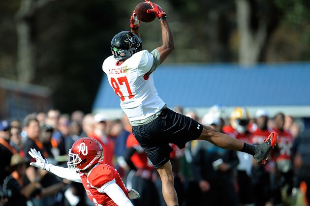 MOBILE, AL - JANUARY 20:  Jordan Matthews #87 of the South team catches a pass over Aaron Colvin #14 during a Senior Bowl practice session at Fairhope Stadium on January 20, 2014 in Fairhope, Alabama.  (Photo by Stacy Revere/Getty Images)