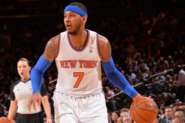NEW YORK, NY - JANUARY 13: Carmelo Anthony #7 of the New York Knicks handling the ball during a game against the Phoenix Sun on January 13, 2014 at Madison Square Garden in New York City, New York. NOTE TO USER: User expressly acknowledges and agrees that, by downloading and or using this photograph, User is consenting to the terms and conditions of the Getty Images License Agreement. Mandatory Copyright Notice: Copyright 2013 NBAE (Photo by Jesse D. Garrabrant/NBAE via Getty Images)