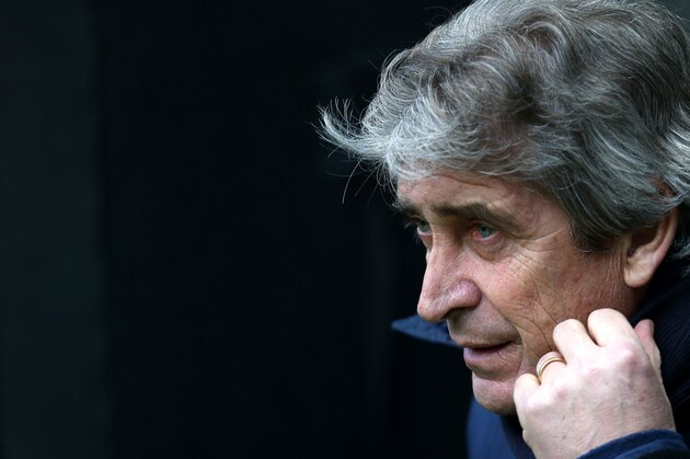 Manchester City's manager Manuel Pellegrini looks omn ahead of their English Premier League soccer match against Newcastle United at St James' Park, Newcastle, England, Sunday, Jan. 12, 2014. (AP Photo/Scott Heppell)
