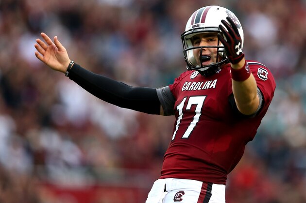 COLUMBIA, SC - NOVEMBER 23:  Dylan Thompson #17 of the South Carolina Gamecocks celebrates after a touchdown during their game against the Coastal Carolina Chanticleers at Williams-Brice Stadium on November 23, 2013 in Columbia, South Carolina.  (Photo by Streeter Lecka/Getty Images)