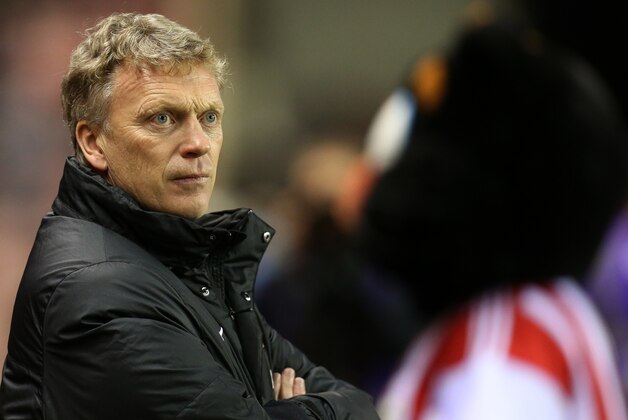 Manchester United's manager David Moyes looks on ahead of their English League Cup semifinal first leg soccer match against Sunderland at the Stadium of Light, Sunderland, England, Tuesday, Jan. 7, 2014. (AP Photo/Scott Heppell)