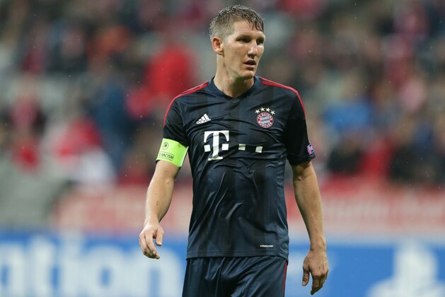 Bayern's Bastian Schweinsteiger watches his team mates during the Champions League group D soccer match between FC Bayern Munich and Viktoria Plzen in Munich, southern Germany, Wednesday, Oct.  23, 2013. (AP Photo/Matthias Schrader)