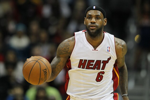 Miami Heat small forward LeBron James (6) drives down the court during the first period of an NBA basketball game against the Atlanta Hawks in Atlanta, Monday, Jan. 20, 2014. (AP Photo/Todd Kirkland)