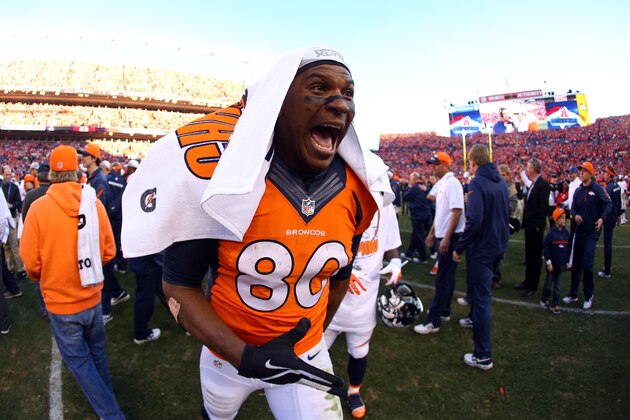 DENVER, CO - JANUARY 19:  Julius Thomas #80 of the Denver Broncos celebrates their 26 to 16 win over the New England Patriots during the AFC Championship game at Sports Authority Field at Mile High on January 19, 2014 in Denver, Colorado.  (Photo by Justin Edmonds/Getty Images)