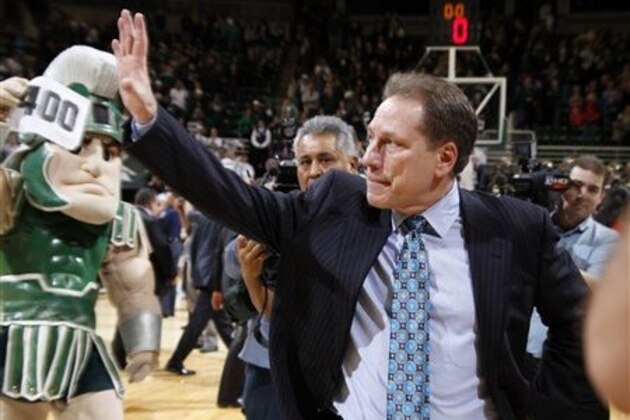 Michigan State coach Tom Izzo acknowledges the crowd after getting his 400th career win in the Spartans' 68-52 victory over Minnesota in an NCAA college basketball game, Wednesday, Jan. 25, 2012, in East Lansing, Mich. (AP Photo/Al Goldis)