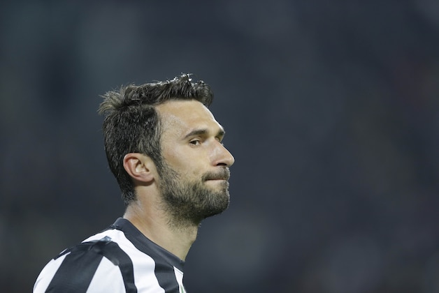 Juventus forward Mirko Vucinic, of Montenegro, watches  during a Serie A soccer match between Inter Juventus and AC Milan, at the Juventus stadium in Turin, Italy, Sunday, April 21, 2013. (AP Photo/Luca Bruno)
