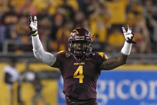 TEMPE, AZ - NOVEMBER 16:  Defensive back Alden Darby #4 of the Arizona State Sun Devils celebrates a defensive stand against the Oregon State Beavers during the fourth quarter of their college football game at Sun Devil Stadium on November 16, 2013 in Tempe, Arizona.  (Photo by Ralph Freso/Getty Images)