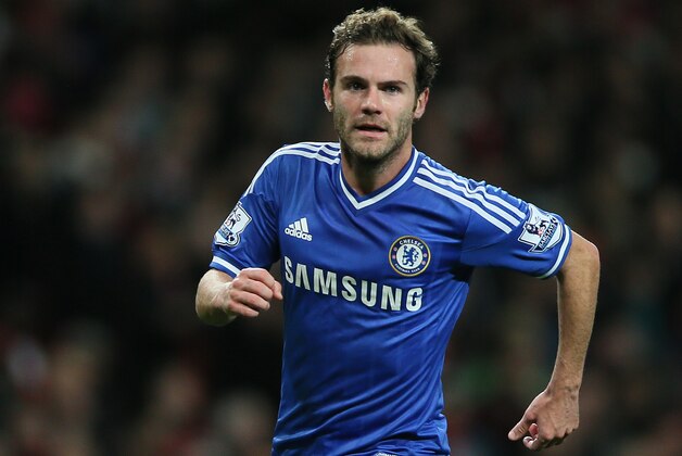 Chelsea's Juan Mata, celebrates after scoring his teams second goal during their English League Cup soccer match between Arsenal and Chelsea at the Emirates stadium in London Tuesday, Oct. 29, 2013. (AP Photo/Alastair Grant)