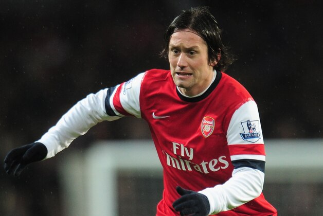 LONDON, ENGLAND - JANUARY 01:  Tomas Rosicky of Arsenal of Arsenal in action during the Barclays Premier League match between Arsenal and Cardiff City at Emirates Stadium on January 1, 2014 in London, England.  (Photo by Shaun Botterill/Getty Images)