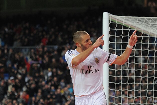 MADRID, SPAIN - NOVEMBER 30: Karim Benzema of Real Madrid CF celebrates after scoring Real's second goal during the La Liga match between Real Madrid CF and Real Valladolid CF at Santiago Bernabeu stadium on November 30, 2013 in Madrid, Spain. (Photo by Denis Doyle/Getty Images) MADRID, SPAIN - NOVEMBER 30: Karim Benzema of Real Madrid CF celebrates after scoring Real's second goal during the La Liga match between Real Madrid CF and Real Valladolid CF at Santiago Bernabeu stadium on November 30, 2013 in Madrid, Spain. (Photo by Denis Doyle/Getty Images)