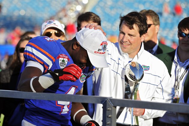 Florida head coach Will Muschamp congratulates Florida wide receiver Andre Debose (4) for being named the Most Valuable Player of the Gator Bowl during the trophy presentation ceremony of the Gator Bowl NCAA college football game, Monday, Jan. 2, 2012, in Jacksonville, Fla. Florida beat Ohio State 24-17. (AP Photo/Stephen Morton) Florida head coach Will Muschamp congratulates Florida wide receiver Andre Debose (4) for being named the Most Valuable Player of the Gator Bowl during the trophy presentation ceremony of the Gator Bowl NCAA college football game, Monday, Jan. 2, 2012, in Jacksonville, Fla. Florida beat Ohio State 24-17. (AP Photo/Stephen Morton)