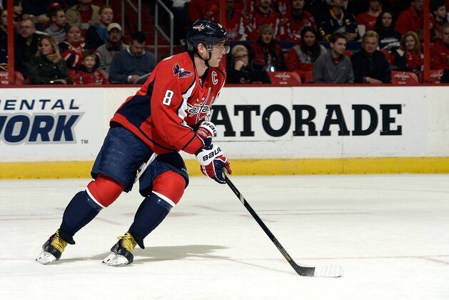 WASHINGTON, DC - JANUARY 12:  Alex Ovechkin #8 of the Washington Capitals controls the puck in the first period during an NHL game against the Buffalo Sabres at Verizon Center on January 12, 2014 in Washington, DC.  (Photo by Patrick McDermott/NHLI via Getty Images)