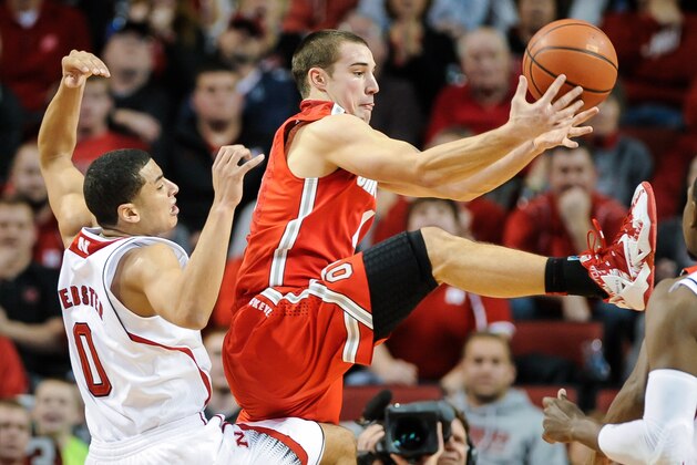 LINCOLN, NE - JANUARY 20: Aaron Craft #4 of the Ohio State Buckeyes grabs a rebound over Tai Webster #0 of the Nebraska Cornhuskers during a game at Pinnacle Bank Arena on January 20, 2014 in Lincoln, Nebraska. (Photo by Eric Francis/Getty Images) LINCOLN, NE - JANUARY 20: Aaron Craft #4 of the Ohio State Buckeyes grabs a rebound over Tai Webster #0 of the Nebraska Cornhuskers during a game at Pinnacle Bank Arena on January 20, 2014 in Lincoln, Nebraska. (Photo by Eric Francis/Getty Images)