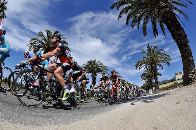 ADELAIDE, AUSTRALIA - JANUARY 21:  Cadel Evans (L) rides near the front of the Peleton during day two of the Tour Down Under on January 21, 2014 in Adelaide, Australia.  (Photo by David Mariuz/Getty Images)