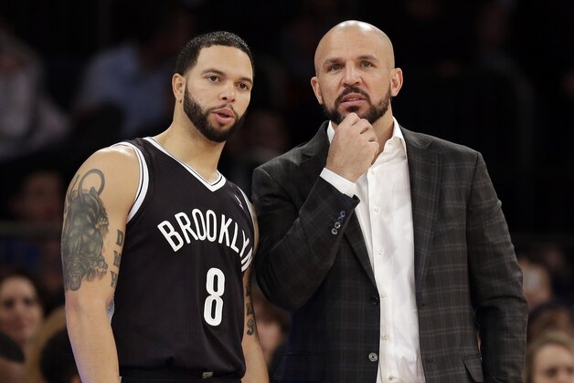 Brooklyn Nets' head coach Jason Kidd, right, talks with Deron Williams during the first half of the NBA basketball game at Madison Square Garden, Monday, Jan. 20, 2014, in New York. (AP Photo/Seth Wenig)