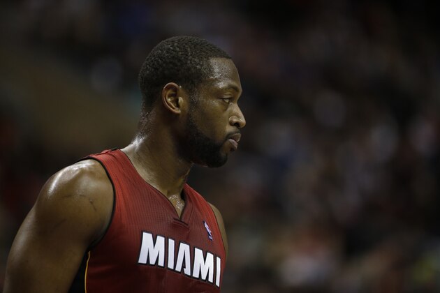 Miami Heat's Dwyane Wade in action during an NBA basketball game against the Philadelphia 76ers, Friday, Jan. 17, 2014, in Philadelphia. (AP Photo/Matt Slocum)