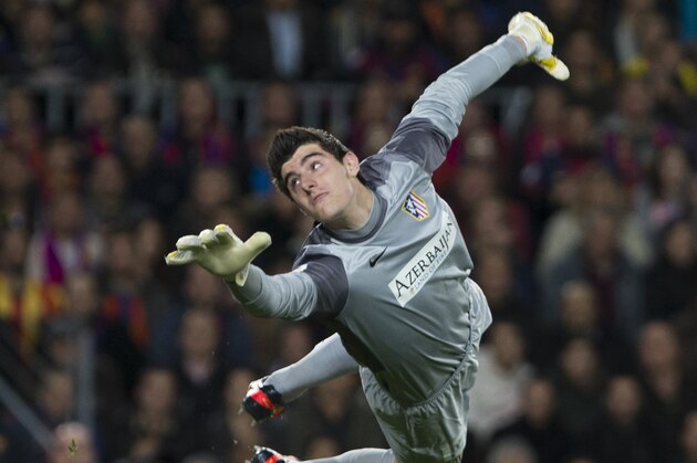 Atletico Madrid's goalkeeper Thibaut Courtois of Belgium fails to stop a shot from FC Barcelona's Adriano during a Spanish La Liga soccer match at the Camp Nou stadium in Barcelona, Spain, Sunday, Dec. 16, 2012, (AP Photo/Bernat Armangue) Atletico Madrid's goalkeeper Thibaut Courtois of Belgium fails to stop a shot from FC Barcelona's Adriano during a Spanish La Liga soccer match at the Camp Nou stadium in Barcelona, Spain, Sunday, Dec. 16, 2012, (AP Photo/Bernat Armangue)