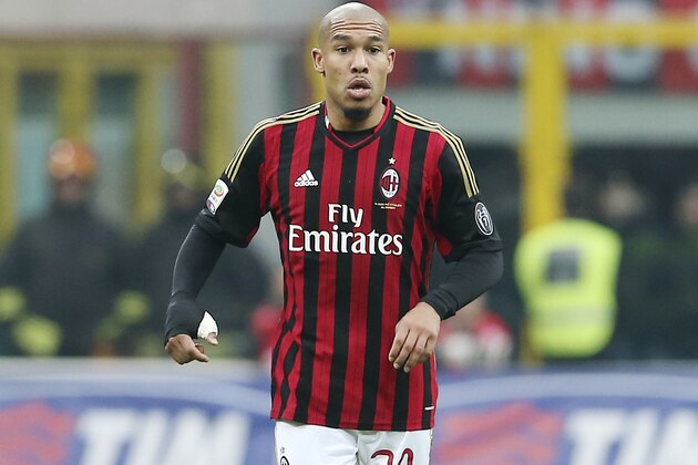 AC Milan midfielder Nigel de Jong, of the Netherlands, controls the ball during the Serie A soccer match between AC Milan and Atalanta at the San Siro stadium in Milan, Italy, Monday, Jan. 6, 2014. (AP Photo/Antonio Calanni)