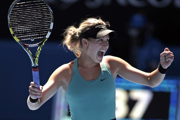 Eugenie Bouchard of Canada celebrates after defeating Ana Ivanovic of Serbia during their quarterfinal at the Australian Open tennis championship in Melbourne, Australia, Tuesday, Jan. 21, 2014. (AP Photo/Rick Rycroft)