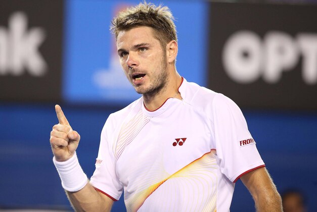 Jan 21, 2014; Melbourne, AUSTRALIA; Stanislas Wawrinka (SUI) challenges a call during his match against Novak Djokovic (SRB) on day nine of the 2014 Australian Open at Melbourne Park.  Mandatory Credit: Nicolas Luttiau/Presse Sports via USA TODAY Sports