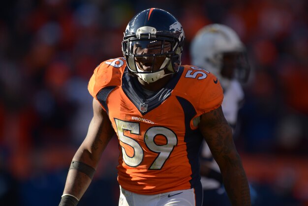 Jan 12, 2014; Denver, CO, USA; Denver Broncos linebacker Danny Trevathan (59) during the 2013 AFC divisional playoff football game against the San Diego Chargers at Sports Authority Field at Mile High. Mandatory Credit: Kirby Lee-USA TODAY Sports